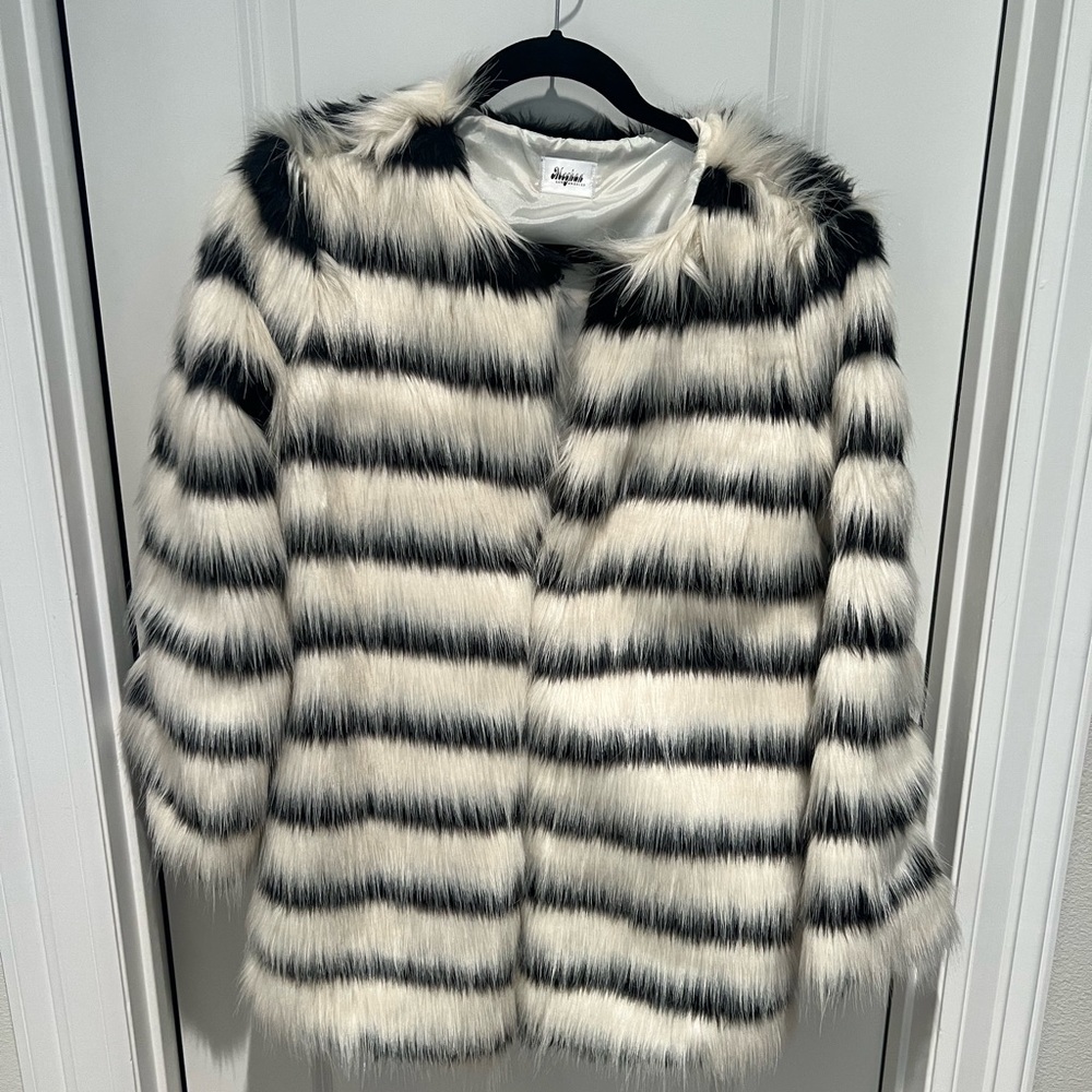 Faux fur jacket by Meghan LA